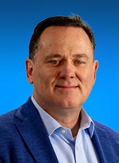 Porträtt av Tom Busher